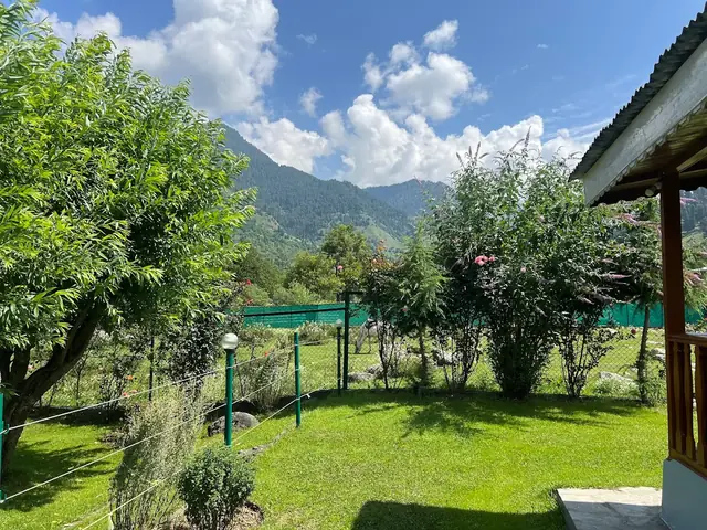 Tulip Cottage garden with mountain backdrop